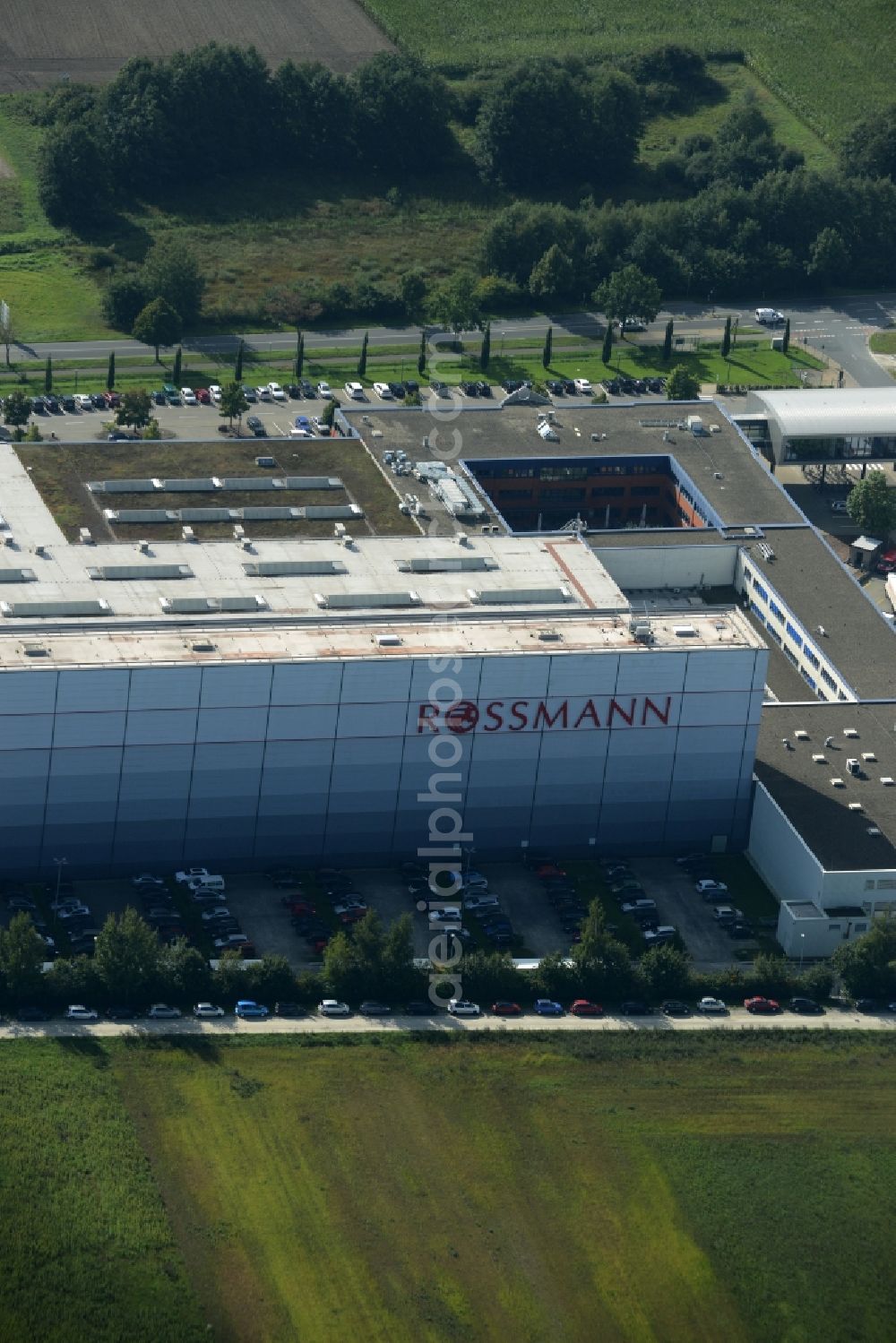 Aerial photograph Burgwedel - Building complex and grounds of the Dirk Rossmann GmbH in Burgwedel in the state of Lower Saxony. The compound includes a logistics centre and the company headquarters and administrative offices of Rossmann