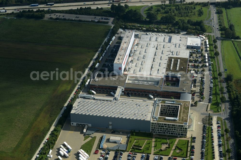 Aerial image Burgwedel - Building complex and grounds of the Dirk Rossmann GmbH in Burgwedel in the state of Lower Saxony. The compound includes a logistics centre and the company headquarters and administrative offices of Rossmann