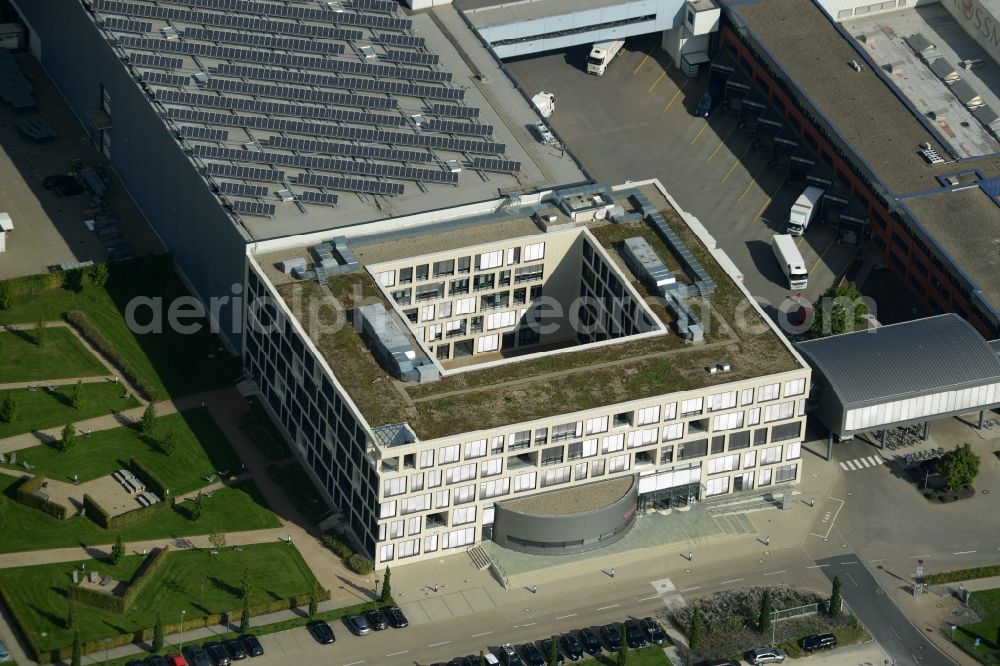 Aerial photograph Burgwedel - Building complex and grounds of the Dirk Rossmann GmbH in Burgwedel in the state of Lower Saxony. The compound includes a logistics centre and the company headquarters and administrative offices of Rossmann