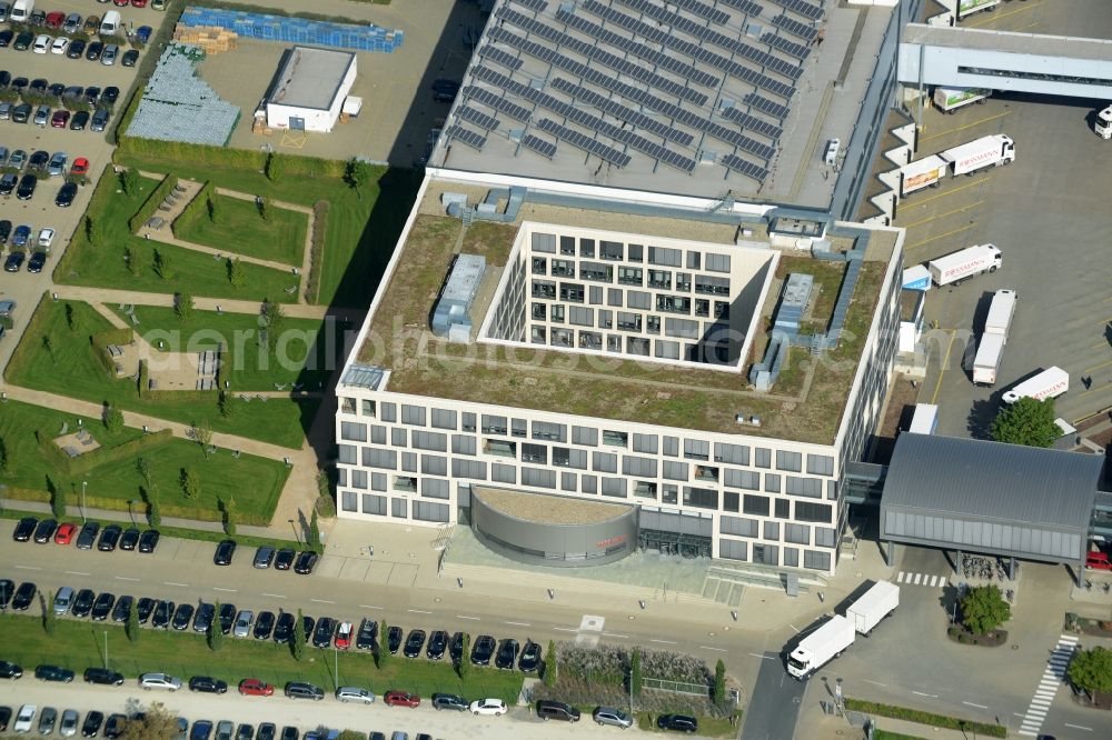 Burgwedel from the bird's eye view: Building complex and grounds of the Dirk Rossmann GmbH in Burgwedel in the state of Lower Saxony. The compound includes a logistics centre and the company headquarters and administrative offices of Rossmann