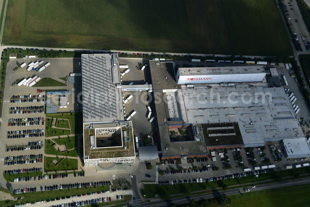 Burgwedel from the bird's eye view: Building complex and grounds of the Dirk Rossmann GmbH in Burgwedel in the state of Lower Saxony. The compound includes a logistics centre and the company headquarters and administrative offices of Rossmann