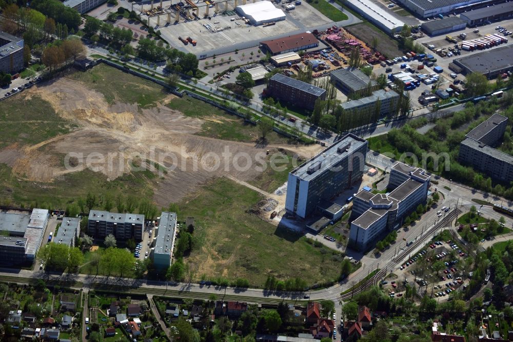 Berlin Hohenschönhausen from the bird's eye view: Site of the former GDR high-rise SHB Special building construction business Company in Berlin Hohenschonhausen. Currently, the ruins of the office building is demolished, the planned construction of new homes is on the site of the former industrial area