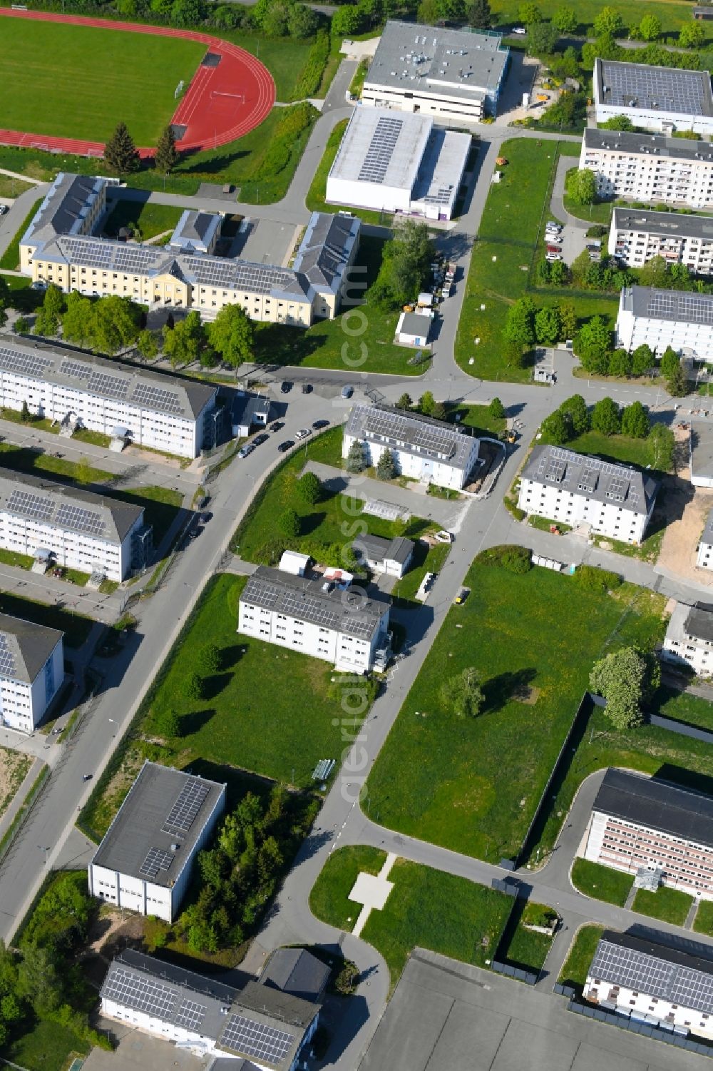 Schneeberg from the bird's eye view: Conversion surfaces on the renatured site of the former barracks and military - real estate in Schneeberg in the state Saxony, Germany