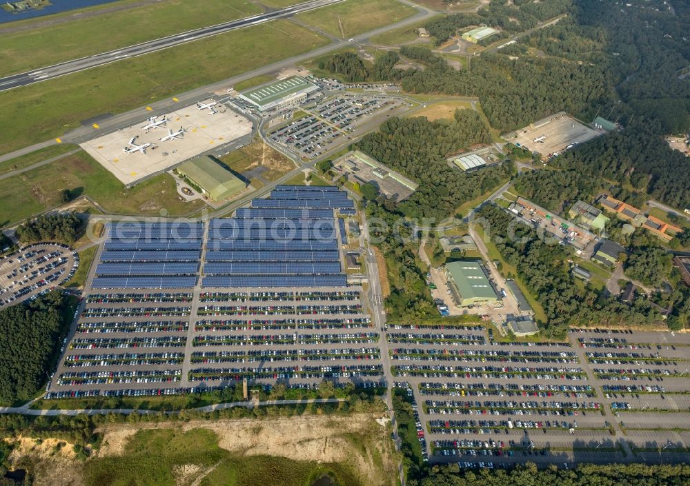 Weeze from above - Runway with hangar taxiways and terminals on the grounds of the airport Airport Weeze Flughafen Niederrhein GmbH in Weeze in the state North Rhine-Westphalia, Germany