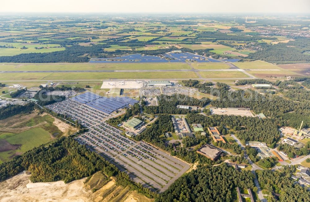 Weeze from above - Runway with hangar taxiways and terminals on the grounds of the airport Airport Weeze Flughafen Niederrhein GmbH in Weeze in the state North Rhine-Westphalia, Germany