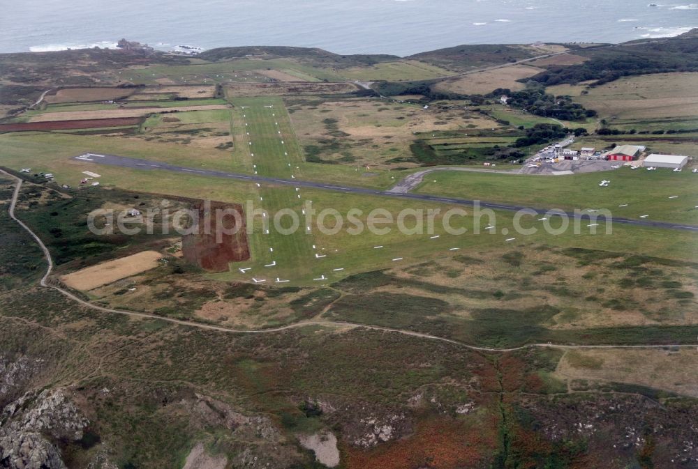 Aerial photograph Aldernay - Runway with hangar taxiways and terminals on the grounds of the airport in Aldernay in Aurigny, Guernsey