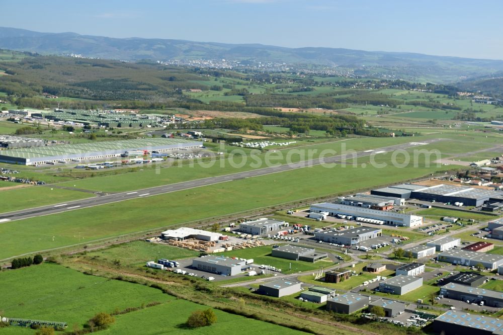 Andrézieux-Bouthéon from above - Runway with hangar taxiways and terminals on the grounds of the airport in Andrezieux-Boutheon in Auvergne Rhone-Alpes, France