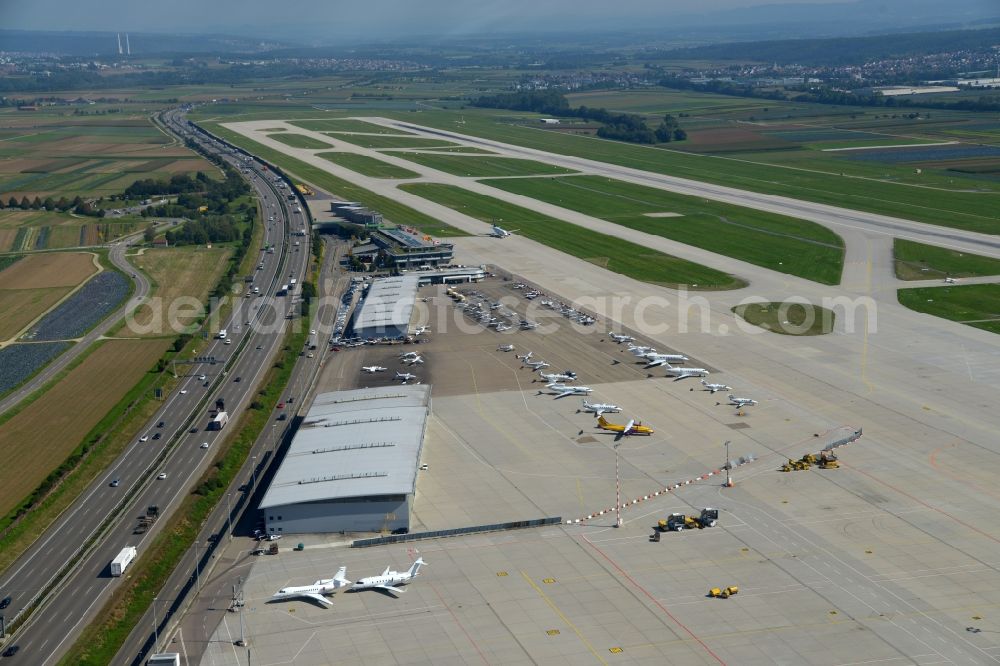 Stuttgart from the bird's eye view: Runway with hangar taxiways and terminals on the grounds of the airport on the apron and the area of the General Aviation GAT in Stuttgart in the state Baden-Wuerttemberg