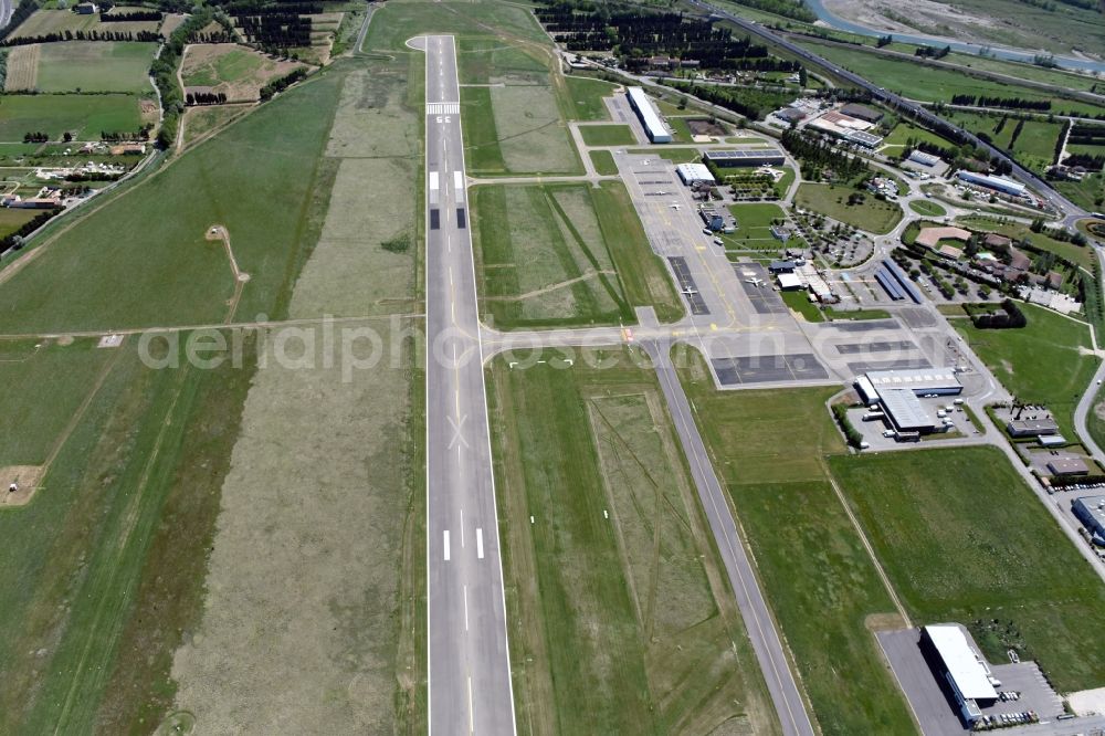 Avignon from above - Runway with hangar taxiways and terminals on the grounds of the airport in Avignon in Provence-Alpes-Cote d'Azur, France