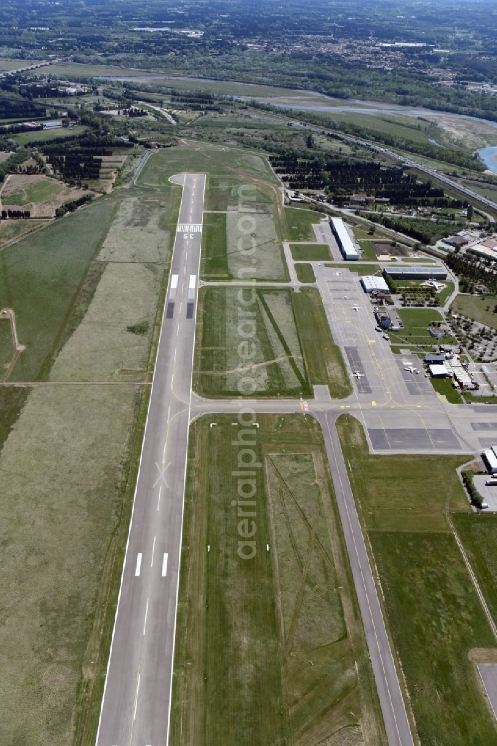 Avignon from the bird's eye view: Runway with hangar taxiways and terminals on the grounds of the airport in Avignon in Provence-Alpes-Cote d'Azur, France