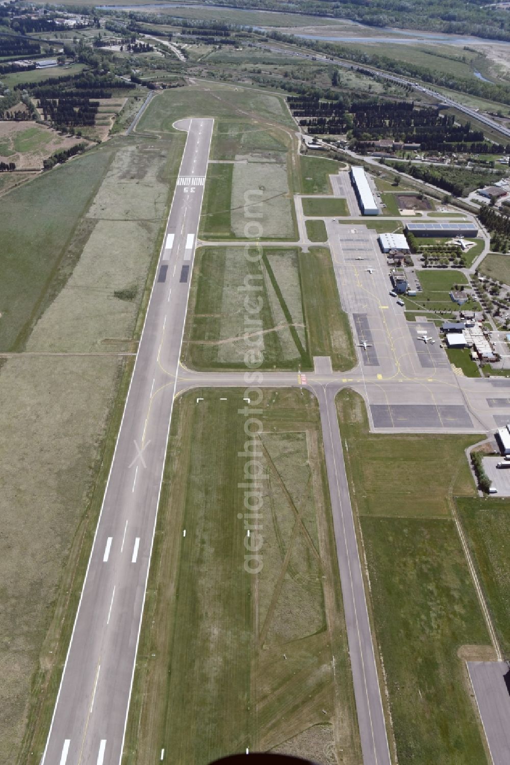 Aerial image Avignon - Runway with hangar taxiways and terminals on the grounds of the airport in Avignon in Provence-Alpes-Cote d'Azur, France