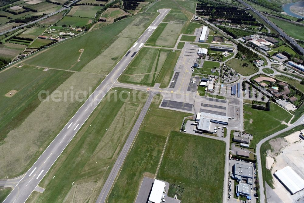 Avignon from above - Runway with hangar taxiways and terminals on the grounds of the airport in Avignon in Provence-Alpes-Cote d'Azur, France