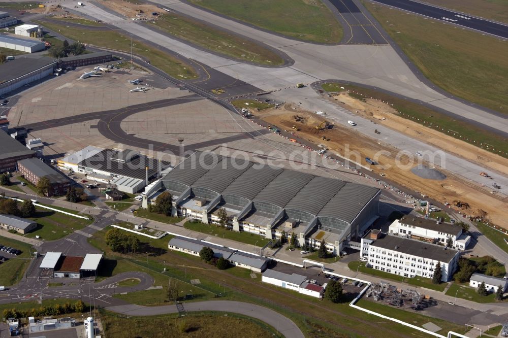 Schönefeld from above - Runway with hangar taxiways on the grounds of the airport BER in Schoenefeld in the state Brandenburg, Germany