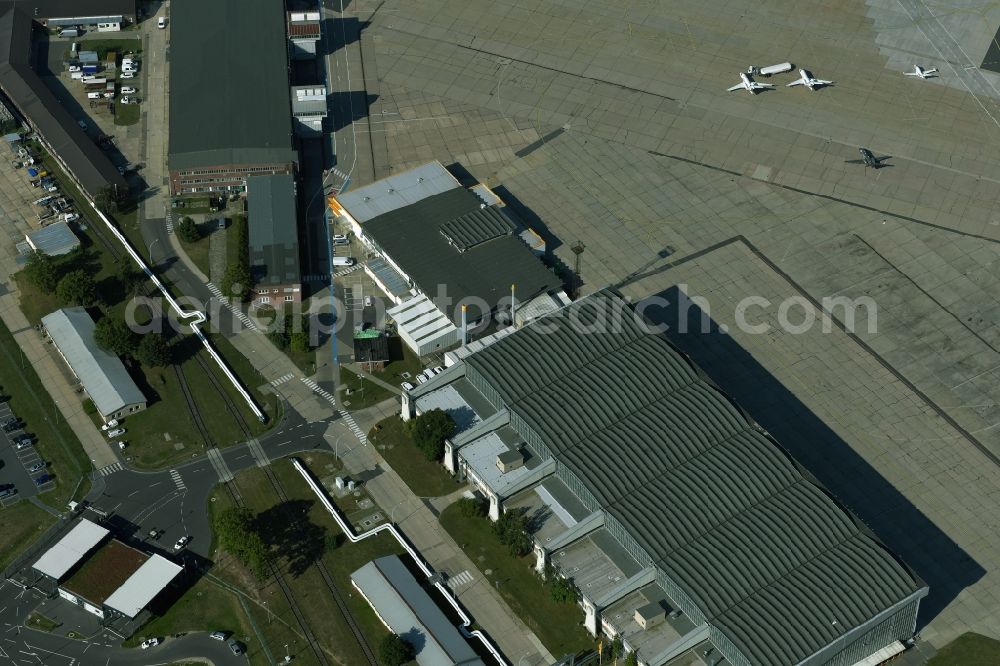 Aerial image Schönefeld - Runway with hangar taxiways and terminals on the grounds of the airport BER International in Schoenefeld in the state Brandenburg