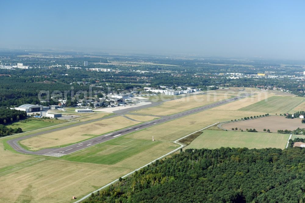 Aerial image Braunschweig - Runway with hangar taxiways and terminals on the grounds of the airport Flughafen Braunschweig-Wolfsburg GmbH in Braunschweig in the state Lower Saxony