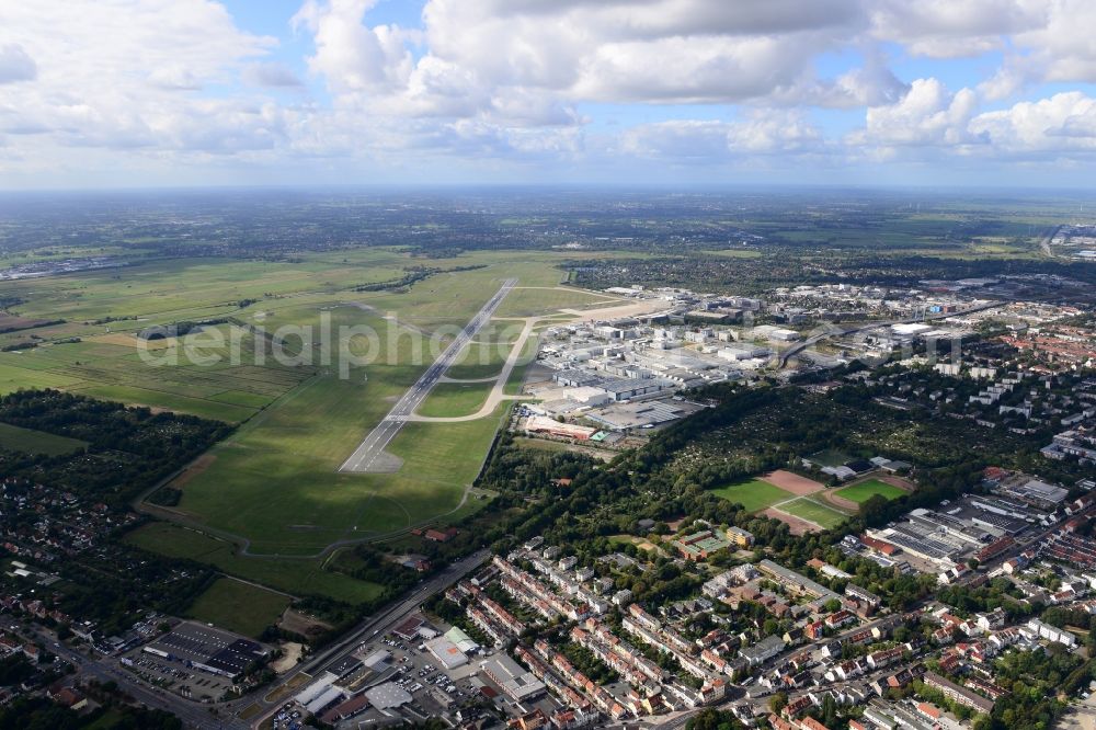 Bremen from the bird's eye view: Runway with hangar taxiways and terminals on the grounds of the airport in Bremen in Germany