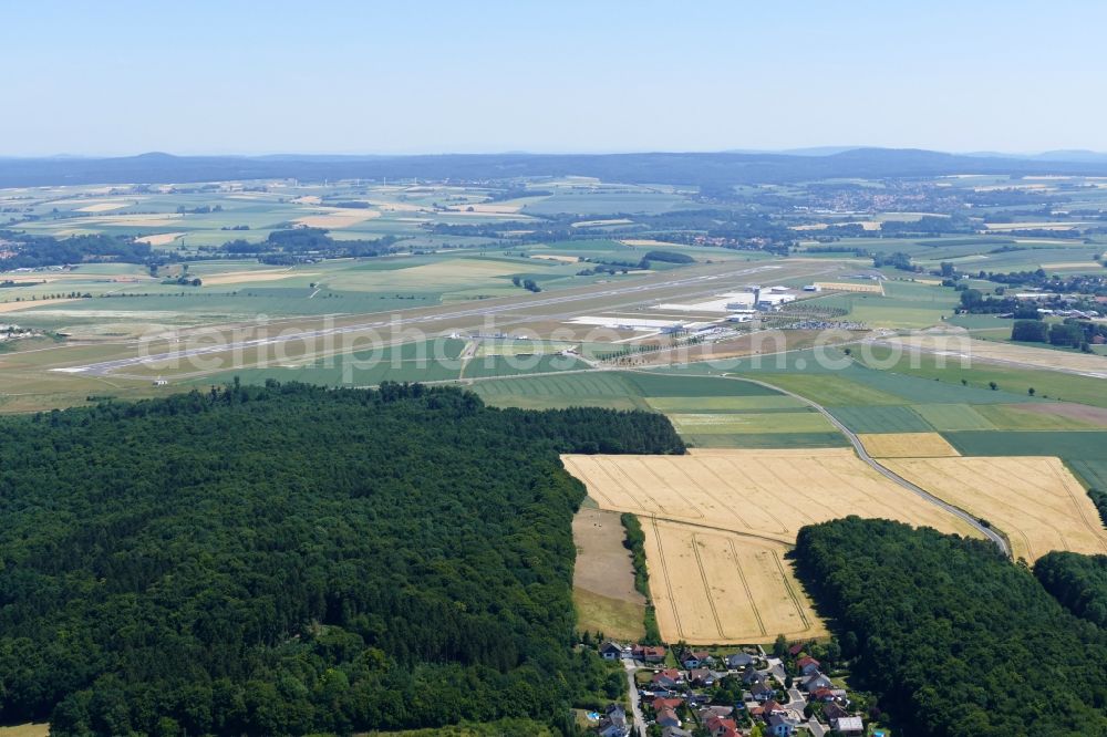 Calden from the bird's eye view: Runway with hangar taxiways and terminals on the grounds of the airport in Calden in the state Hessen