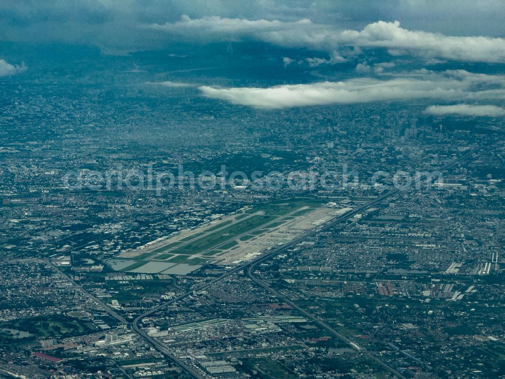 Aerial image Bangkok - Runway with hangar taxiways and terminals on the grounds of the airport Don Mueang International Airport on street Vibhavadi Rangsit Road in Bangkok in Krung Thep Maha Nakhon, Thailand