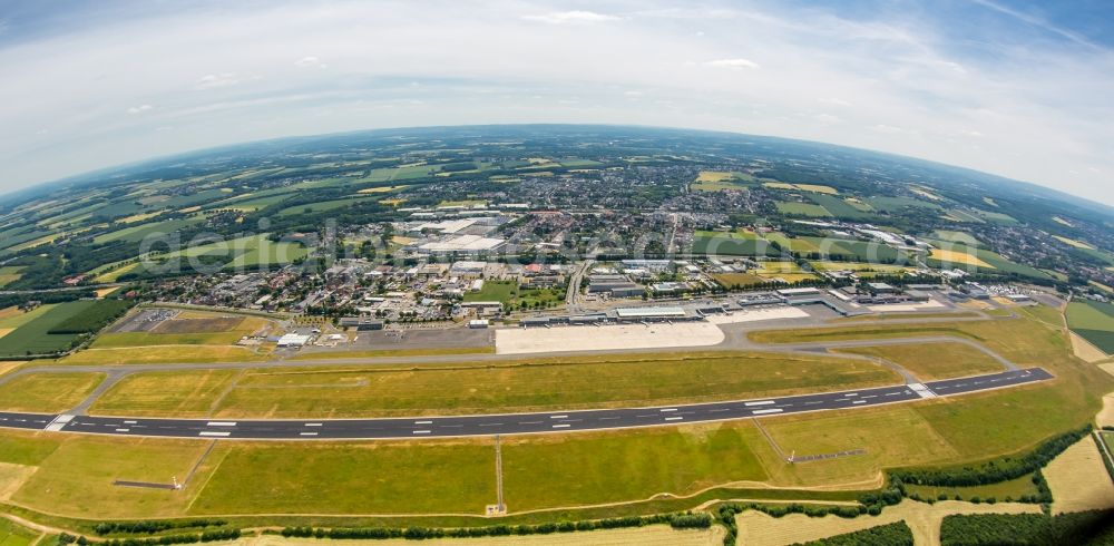 Dortmund from the bird's eye view: Runway with hangar taxiways and terminals on the grounds of the airport in Dortmund in the state North Rhine-Westphalia