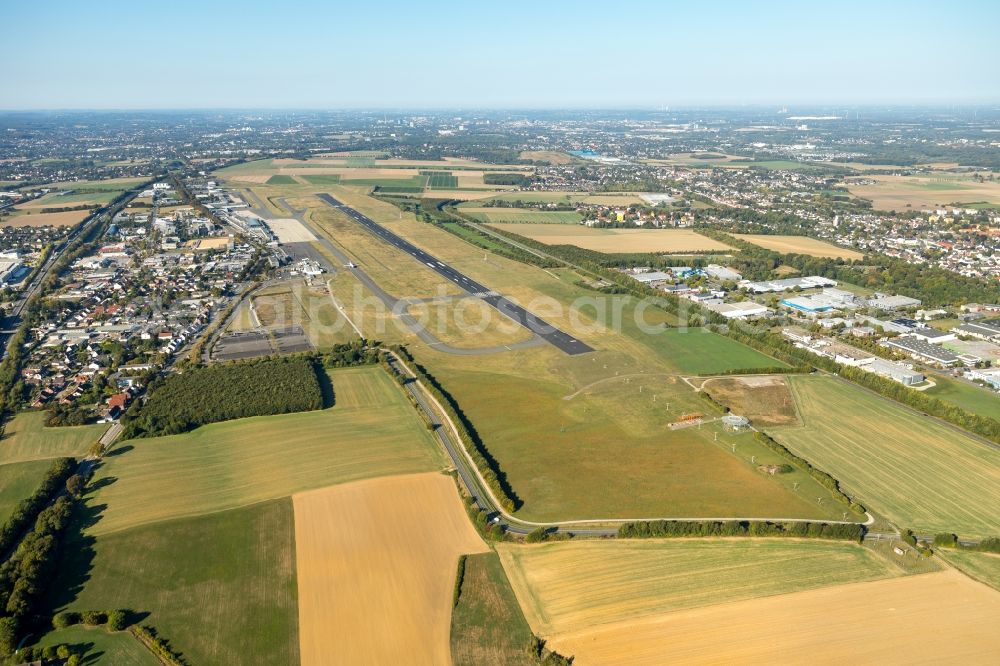 Aerial photograph Dortmund - Runway with hangar taxiways and terminals on the grounds of the airport in Dortmund in the state North Rhine-Westphalia, Germany