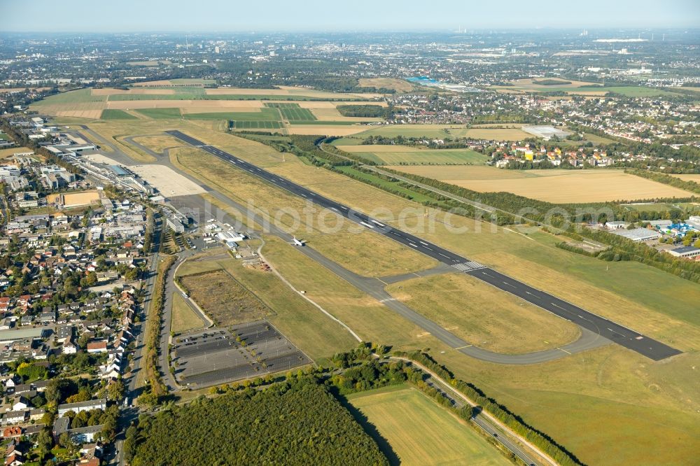 Dortmund from above - Runway with hangar taxiways and terminals on the grounds of the airport in Dortmund in the state North Rhine-Westphalia, Germany