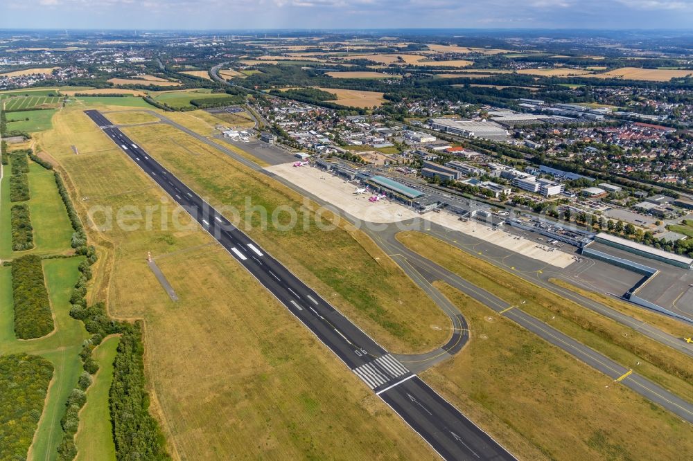 Aerial photograph Dortmund - Runway with hangar taxiways and terminals on the grounds of the airport in Dortmund in the state North Rhine-Westphalia, Germany