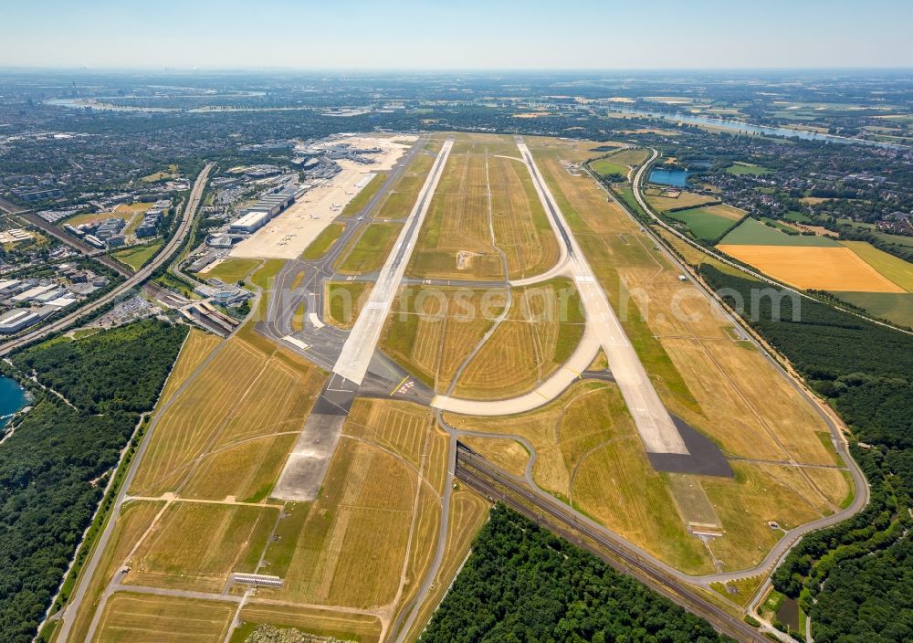 Düsseldorf from above - Runway with hangar taxiways and terminals on the grounds of the airport in Duesseldorf in the state North Rhine-Westphalia, Germany