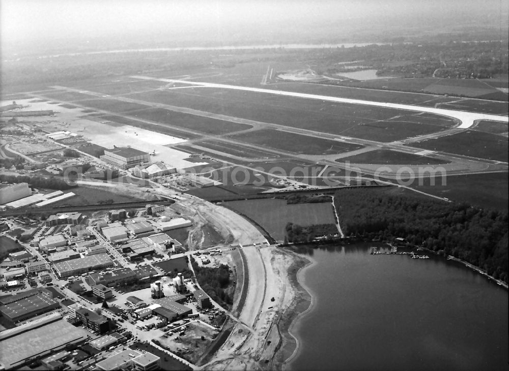 Düsseldorf from above - Runway with hangar taxiways and terminals on the grounds of the airport in Duesseldorf in the state North Rhine-Westphalia, Germany