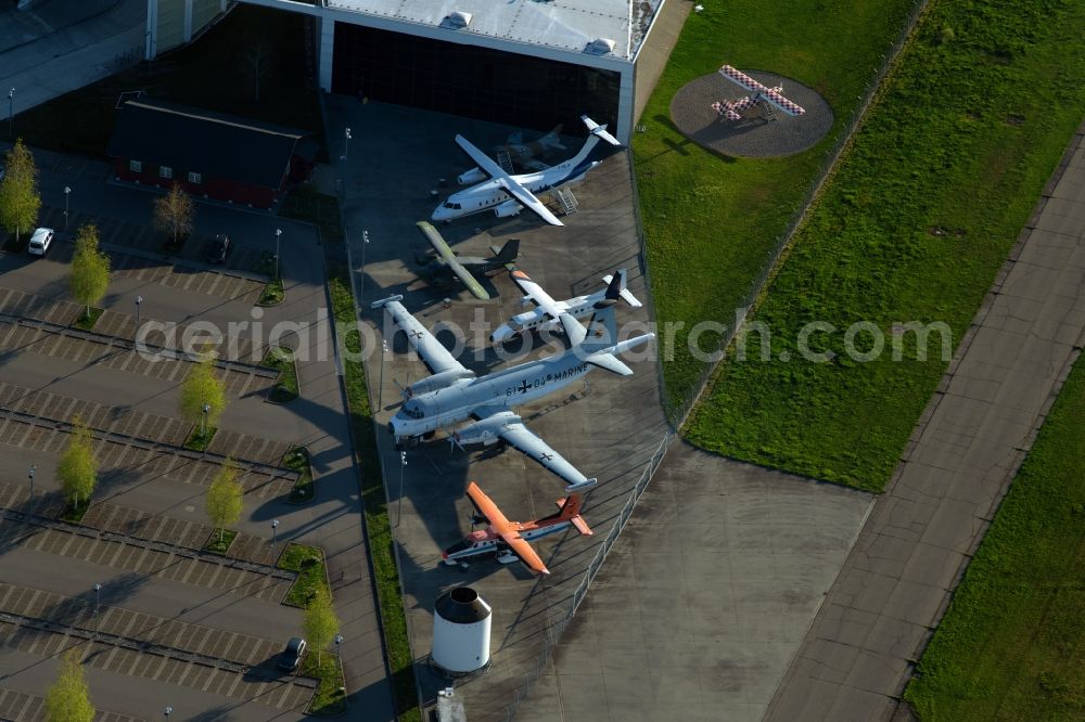 Friedrichshafen from the bird's eye view: Runway with Hangars, taxiways, fair grounds, Dornier Museum and terminals on the grounds of the airport EDNY in Friedrichshafen in the state Baden-Wuerttemberg, Germany