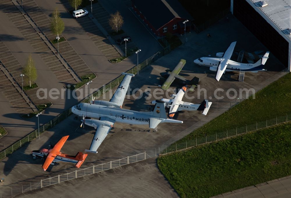 Aerial image Friedrichshafen - Runway with Hangars, taxiways, fair grounds, Dornier Museum and terminals on the grounds of the airport EDNY in Friedrichshafen in the state Baden-Wuerttemberg, Germany