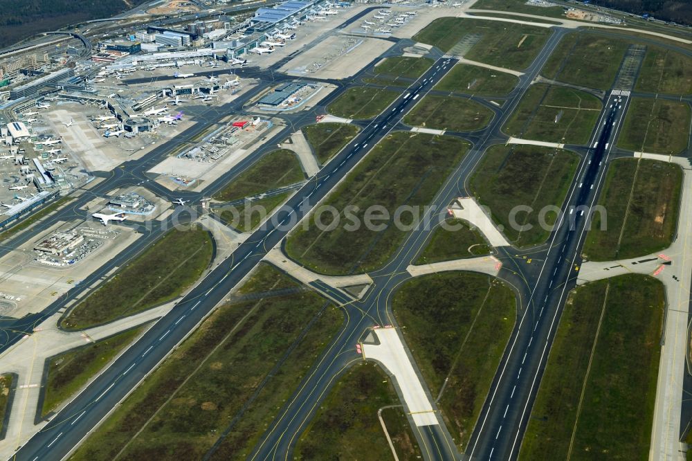 Aerial image Frankfurt am Main - Runway with hangar taxiways and terminals on the grounds of the airport in Frankfurt in the state Hesse, Germany