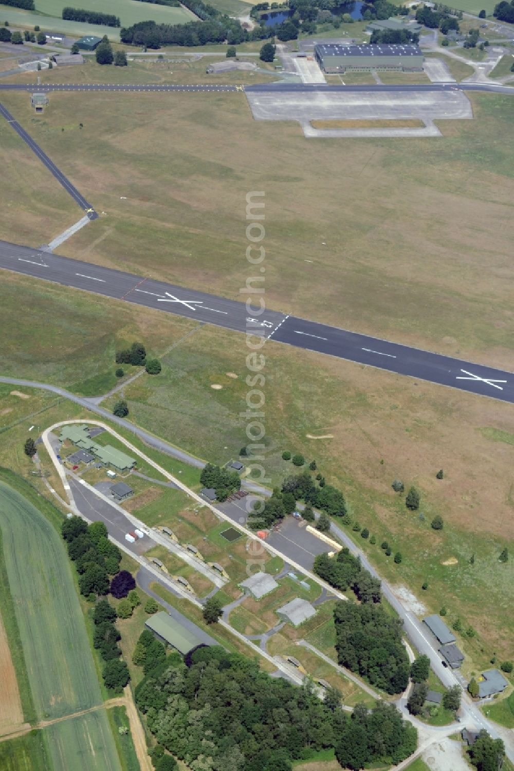 Gütersloh from above - Runway with hangar taxiways and terminals on the grounds of the airport in Guetersloh in the state North Rhine-Westphalia