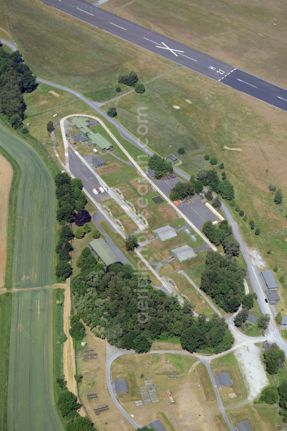 Gütersloh from the bird's eye view: Runway with hangar taxiways and terminals on the grounds of the airport in Guetersloh in the state North Rhine-Westphalia