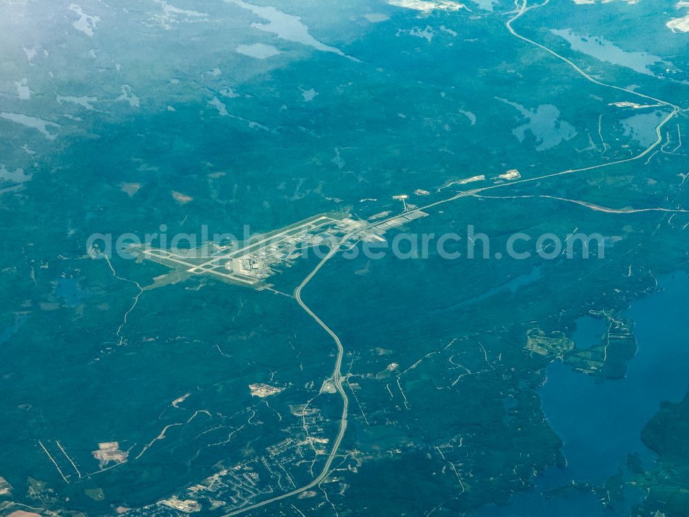 Goffs from the bird's eye view: Runway with hangar taxiways and terminals on the grounds of the airport Halifax Stanfield International Airport on street Bell Boulevard in Goffs in Nova Scotia, Canada