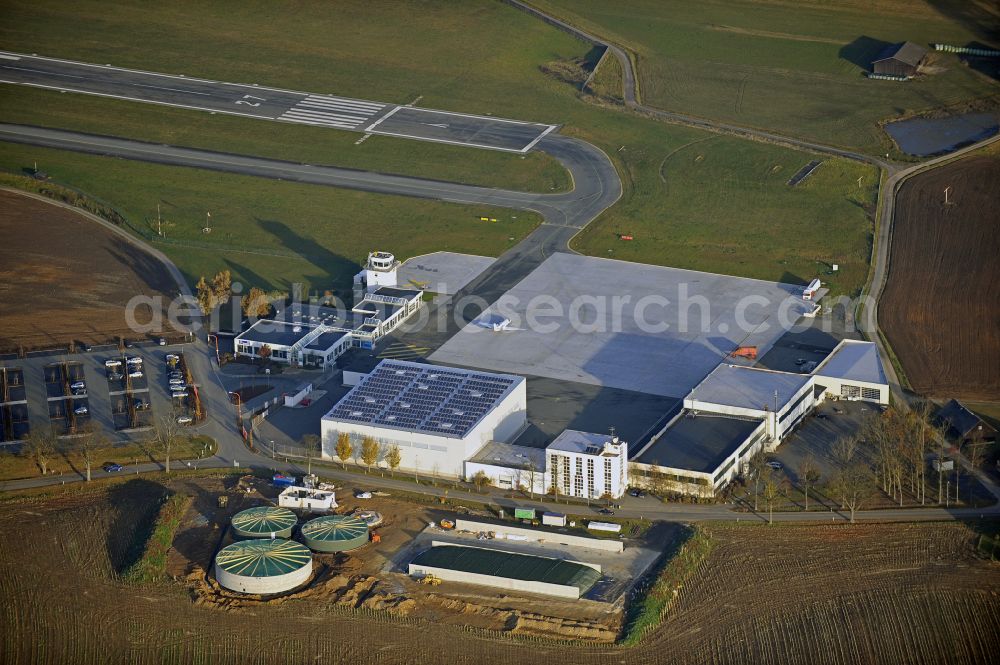 Hof from above - Runway with hangar taxiways and terminals on the grounds of the airport in Hof in the state Bavaria, Germany