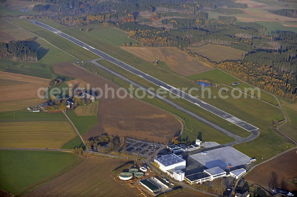 Hof from the bird's eye view: Runway with hangar taxiways and terminals on the grounds of the airport in Hof in the state Bavaria, Germany