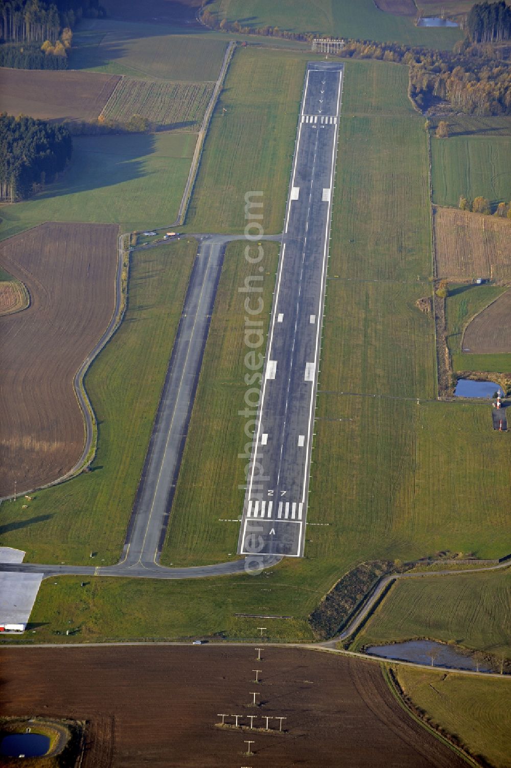 Aerial image Hof - Runway with hangar taxiways and terminals on the grounds of the airport in Hof in the state Bavaria, Germany