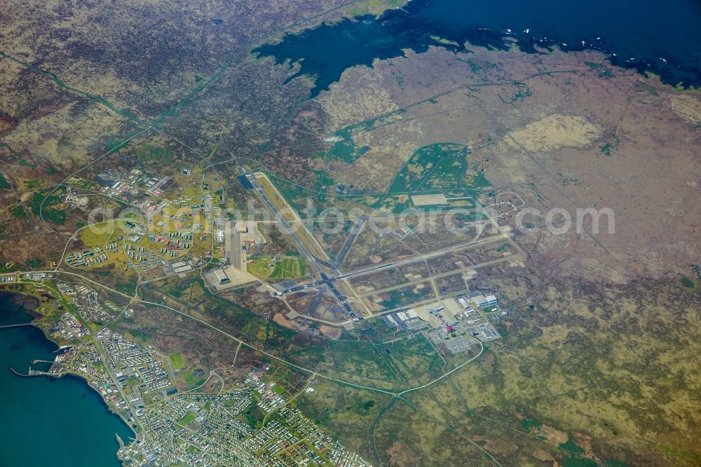 Aerial image Keflavik - Runway with hangar taxiways and terminals on the grounds of the airport in Keflavik in Suournes, Iceland