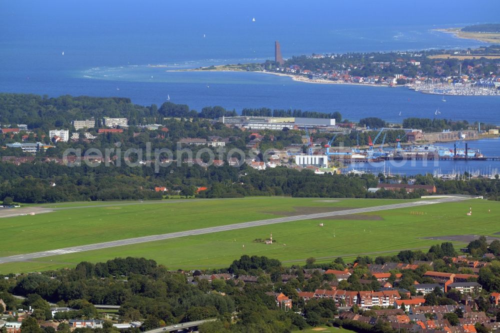 Kiel from above - Runway with hangar taxiways and terminals on the grounds of the airport in Kiel in the state Schleswig-Holstein