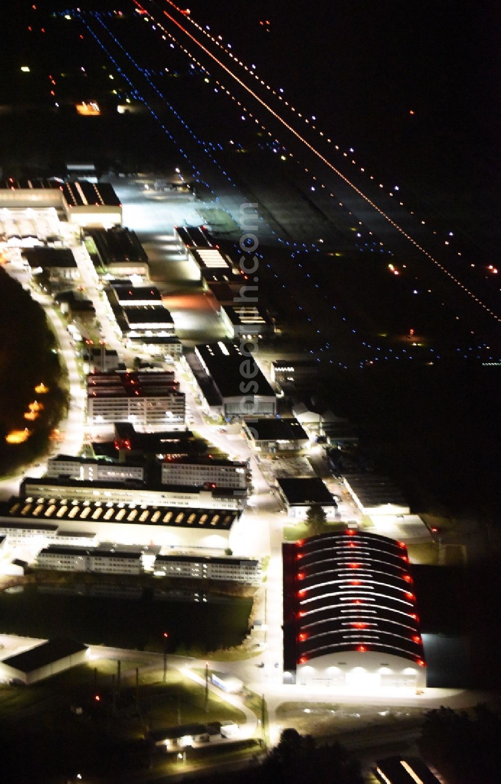 Manching from above - Night view Runway with hangar taxiways and terminals on the grounds of the airport in Manching in the state Bavaria