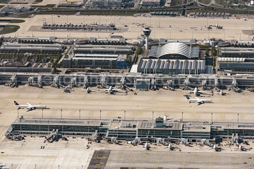 München from above - Runway with hangar taxiways and terminals on the grounds of the airport in Munich in the state Bavaria, Germany