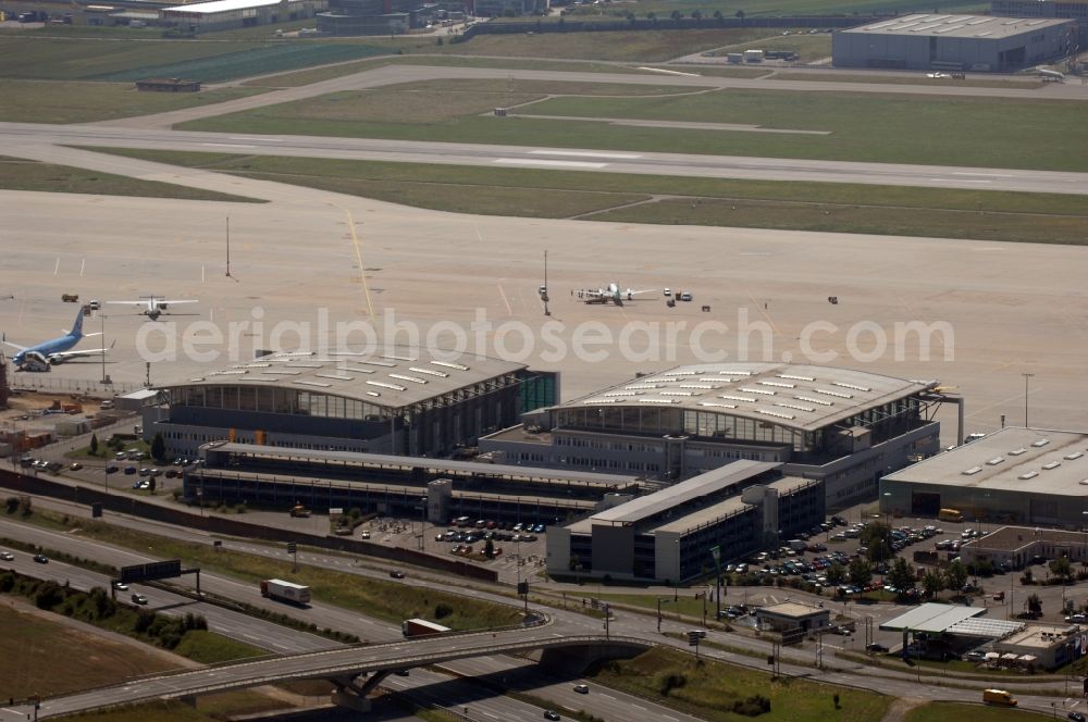 Stuttgart from the bird's eye view: Runway with hangar taxiways and terminals on the grounds of the airport in the district Bernhausen in Stuttgart in the state Baden-Wuerttemberg, Germany