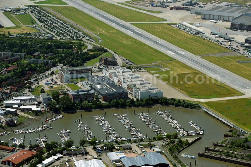 Aerial photograph Hamburg - Runway with hangar taxiways and terminals on the grounds of the airport in the district Finkenwerder in Hamburg, Germany