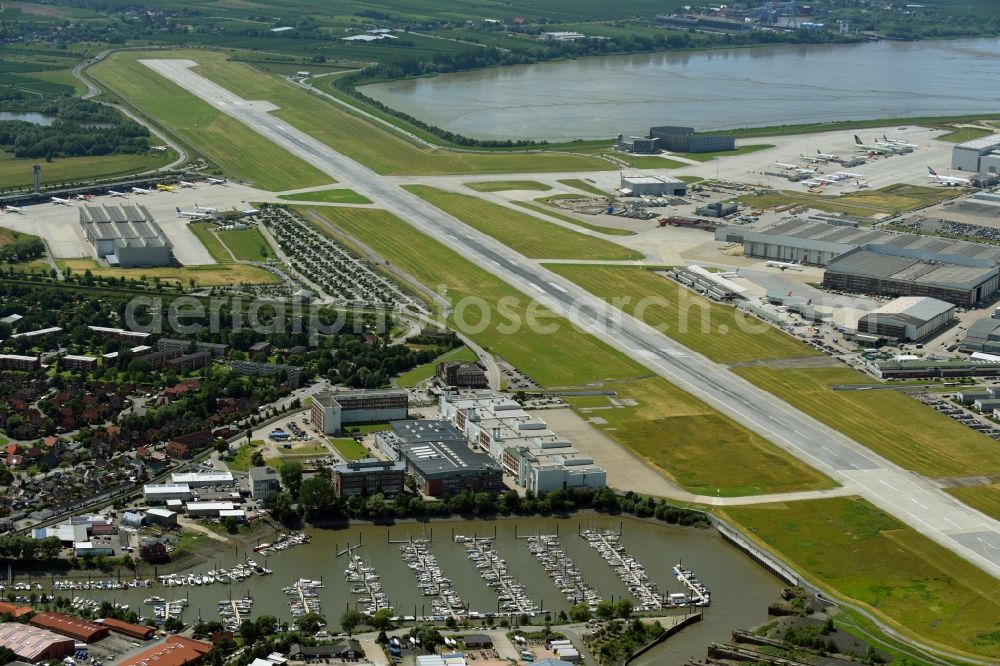 Hamburg from above - Runway with hangar taxiways and terminals on the grounds of the airport in the district Finkenwerder in Hamburg, Germany