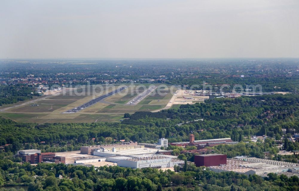 Aerial photograph Berlin - Runway with hangar taxiways and terminals on the grounds of the airport in the district Tegel in Berlin, Germany