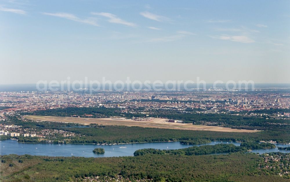 Berlin from above - Runway with hangar taxiways and terminals on the grounds of the airport in the district Tegel in Berlin, Germany