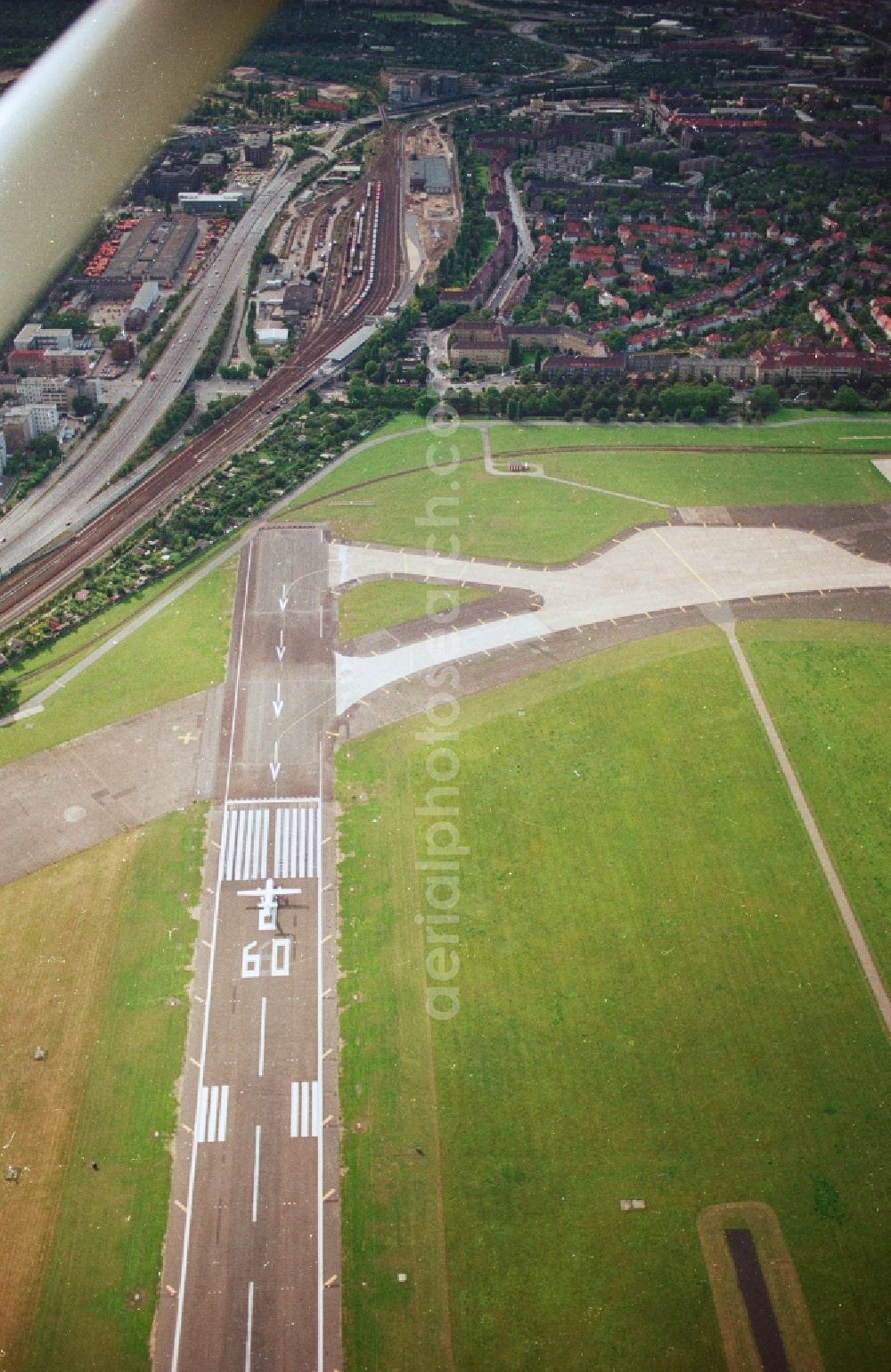 Aerial photograph Berlin - Runway with hangar taxiways and terminals on the grounds of the airport in the district Tempelhof in Berlin