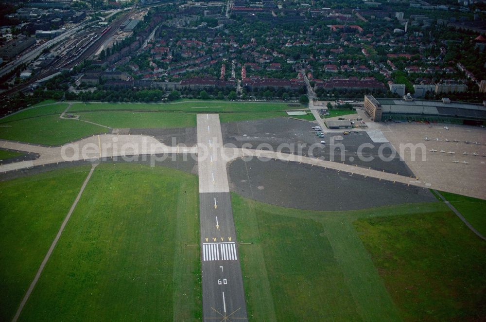 Berlin from above - Runway with hangar taxiways and terminals on the grounds of the airport in the district Tempelhof in Berlin