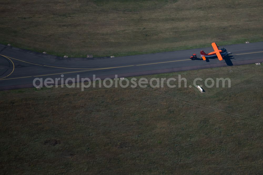 Braunschweig from above - Runway with hangar taxiways and terminals on the grounds of the airport in the district Waggum in Brunswick in the state Lower Saxony, Germany