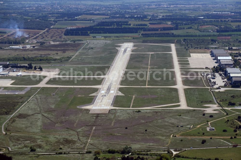 Saint-Gilles from the bird's eye view: Runway with hangar taxiways and terminals on the grounds of the airport Nimes Airport in Saint-Gilles in Languedoc-Roussillon Midi-Pyrenees, France